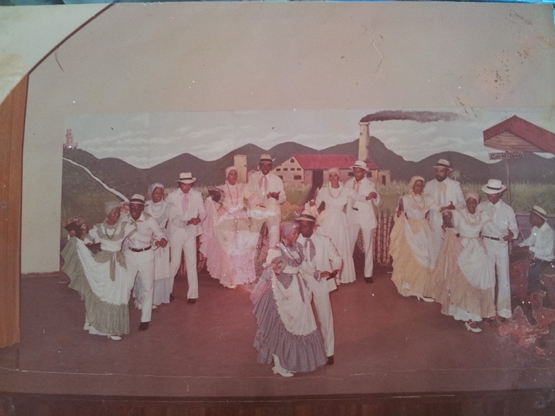 A group of people dancing Bomba on a stage