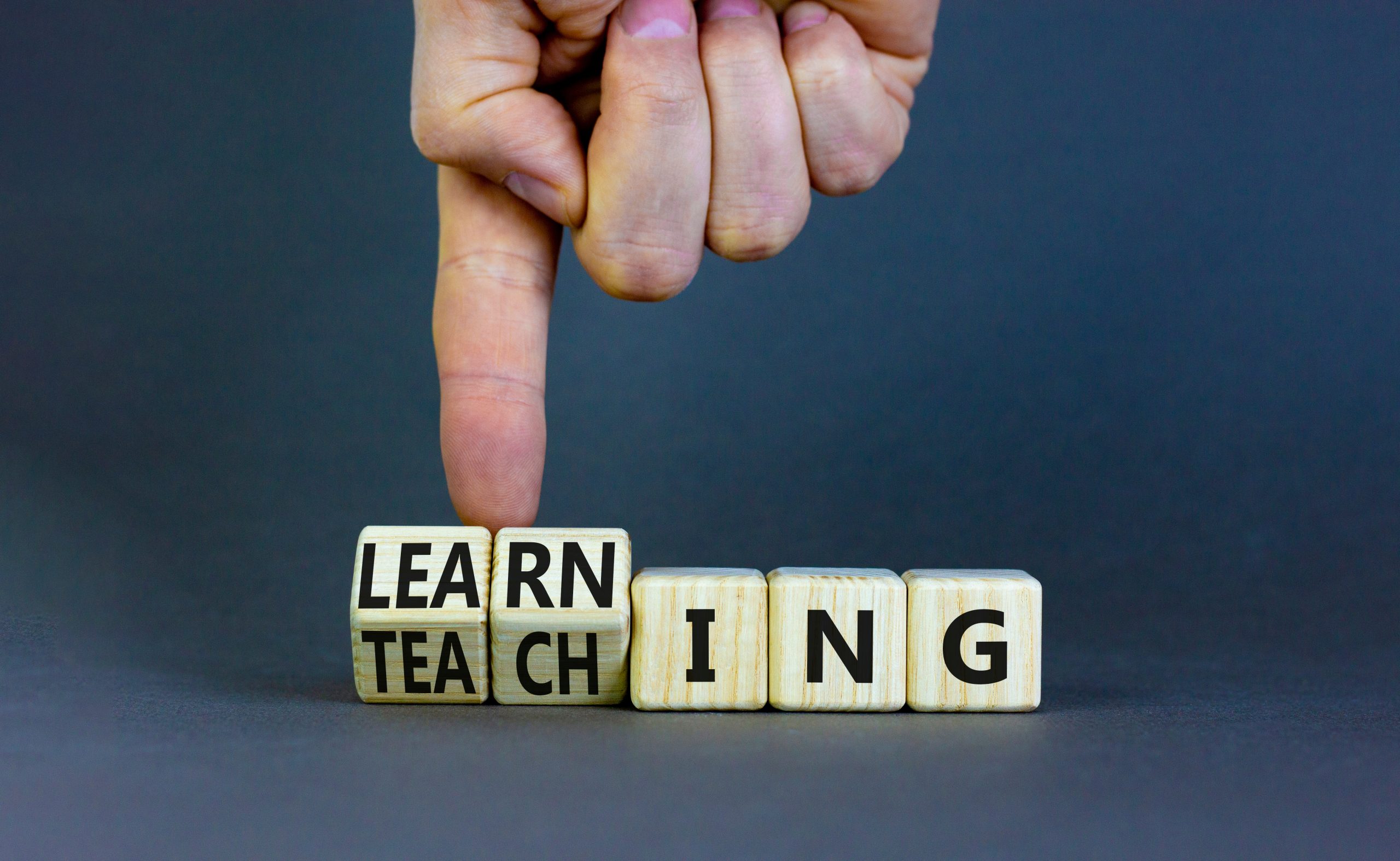 Letter blocks that read teaching and learning
