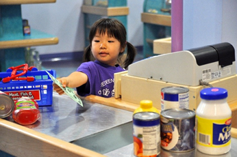 A photograph of child "playing pretend."