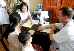 Vietnamese family at a military clinic