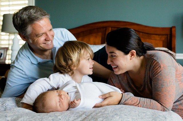 A family smiling at one another