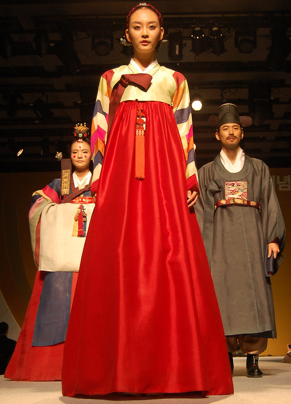 A korean woman in a hanbok, a wrapped dress with an empire <a href=