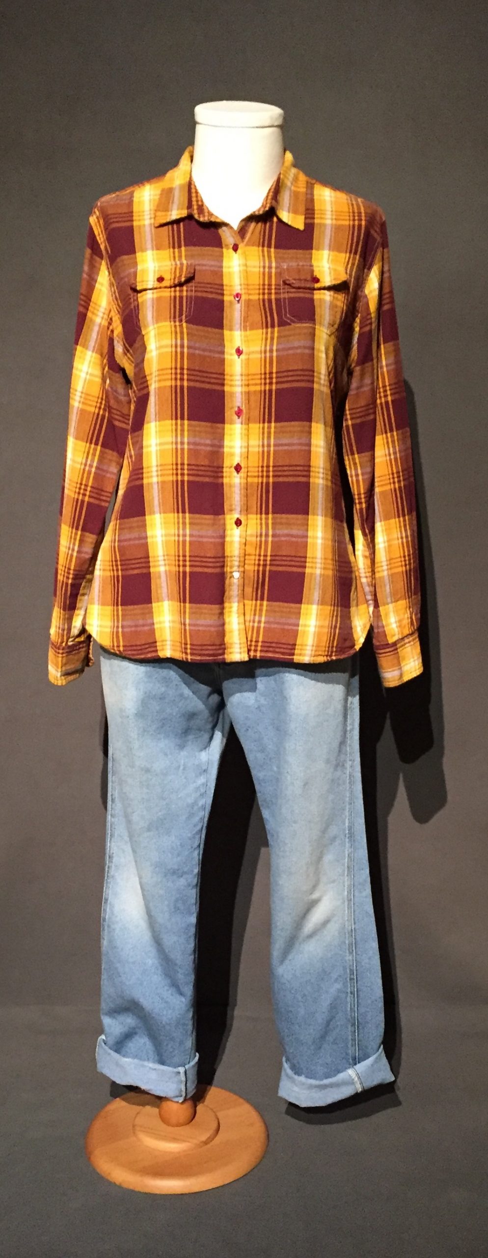 Yellow and brown plaid long sleeve button-down shirt.