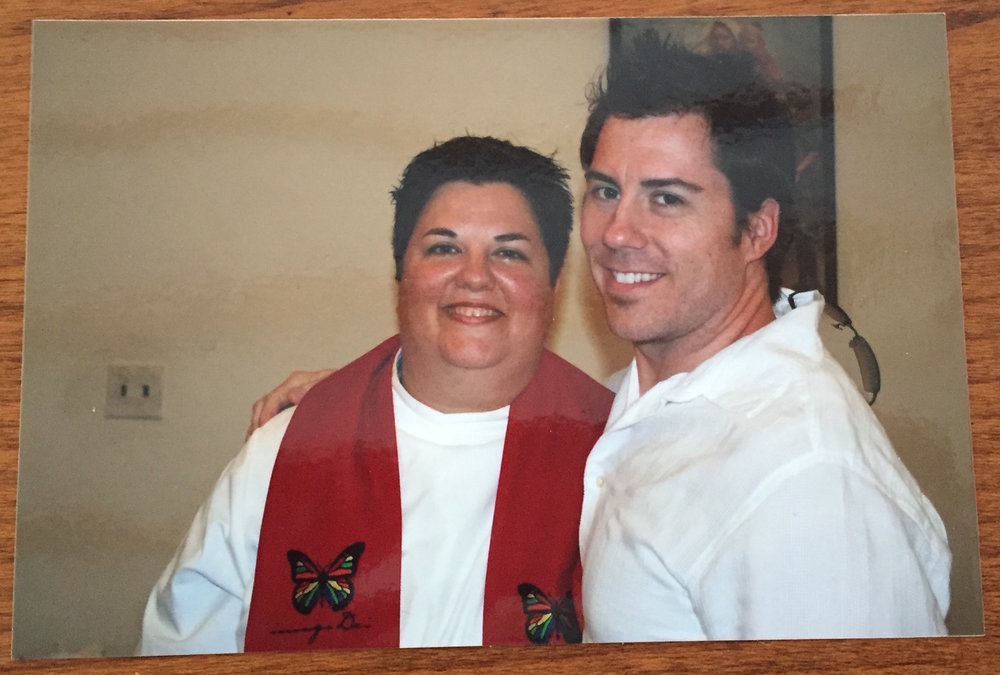 Jennifer with a friend wearing white alb and red stole