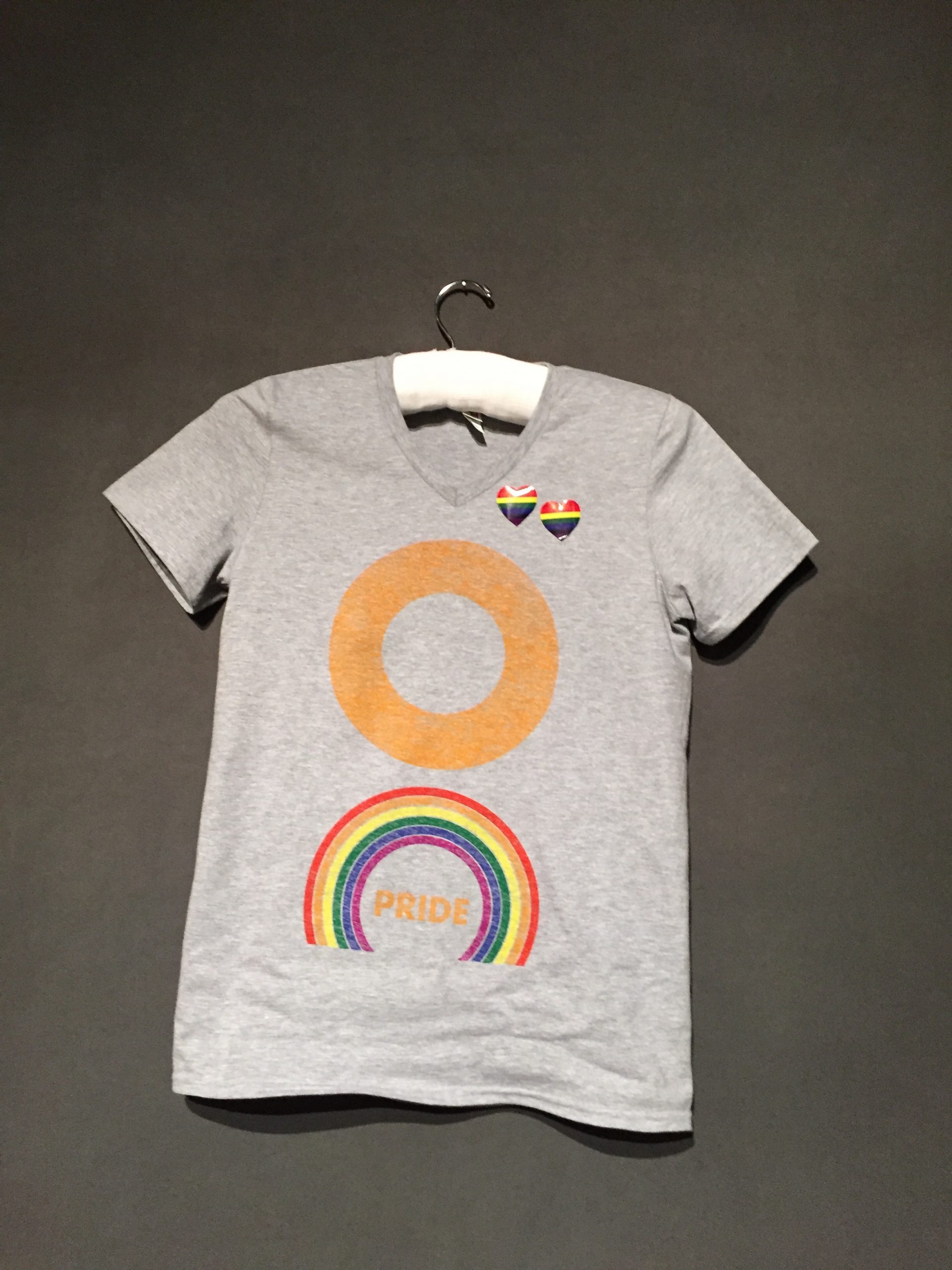 Gray short sleeve t-shirt with orange and rainbow rings