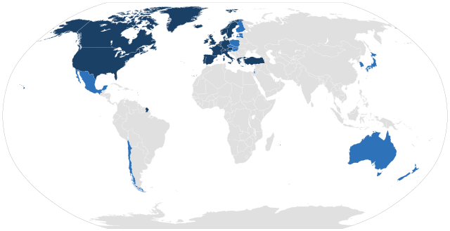 figure of the globe with North America, Western Europe, Chile, Japan, and Australia colored dark. Much of the map is greyed out to mark that they are note OECD original members.