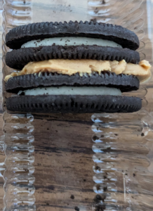 two oreos with peanut butter in between