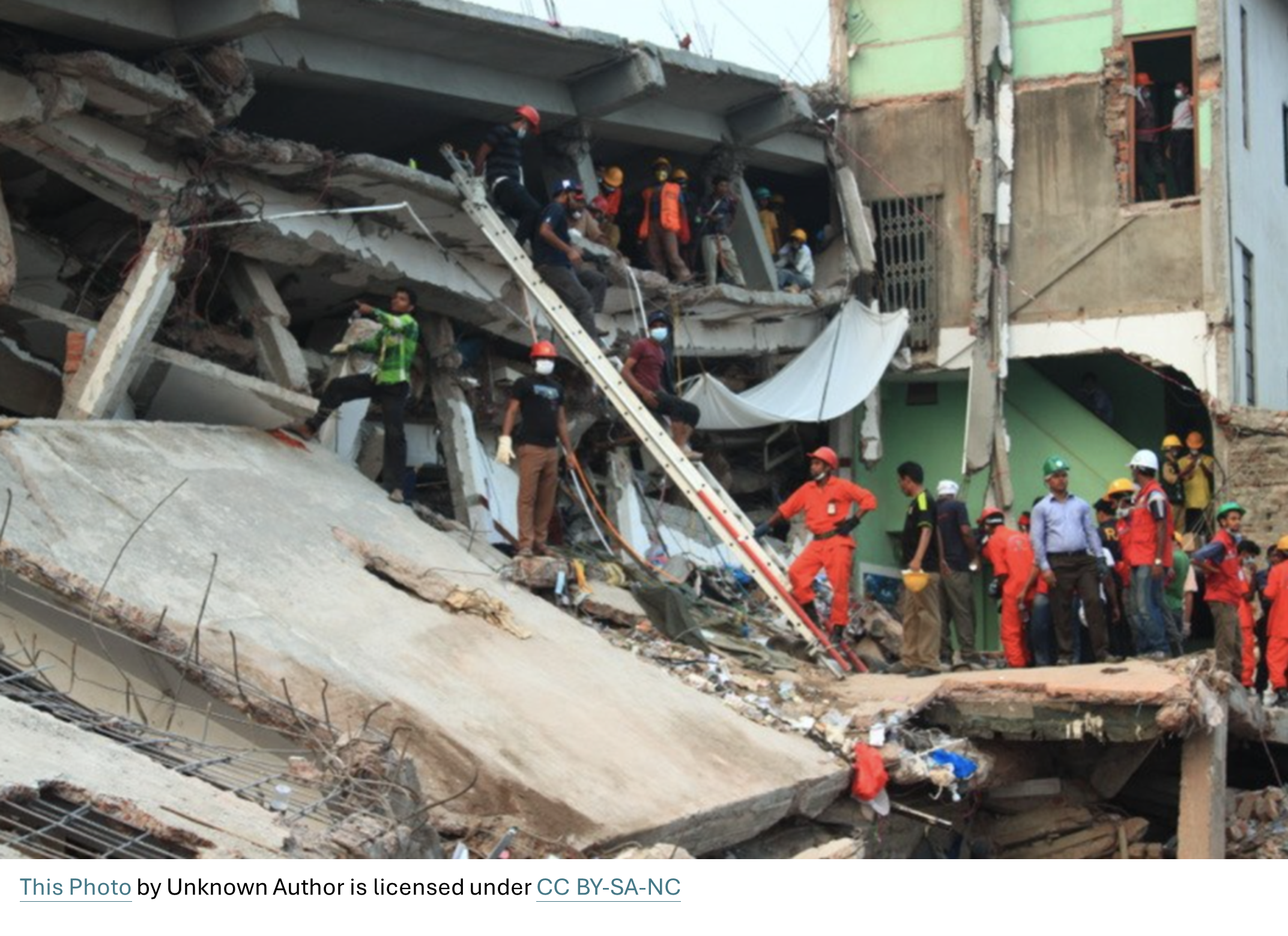 Rescue team stood at the site of Rana Plaza collapse.